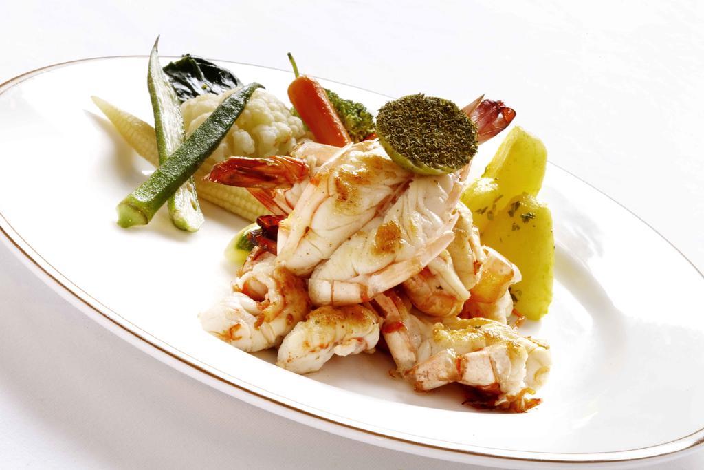 Heritage Madurai Exterior photo A prepared crab